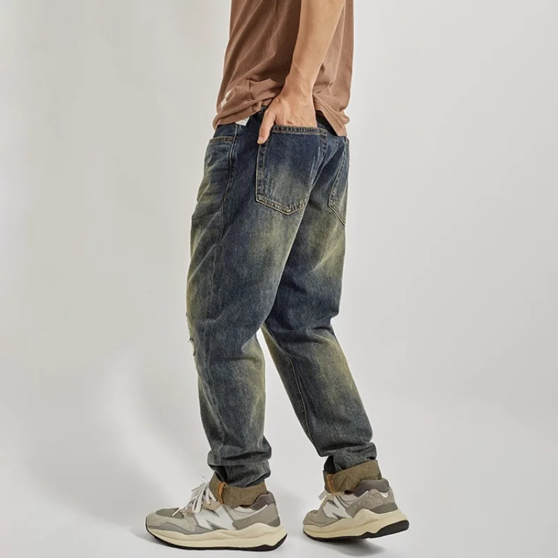 Washed Distressed Tappered Leg Jeans