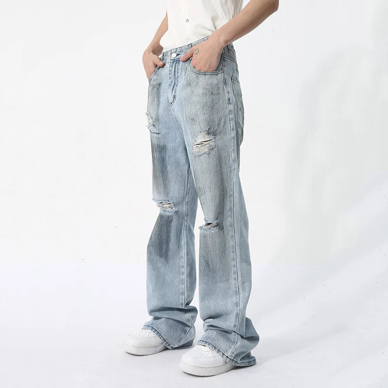 Ripped Loose Fit Washed Denim Jeans
