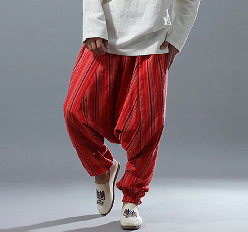 Rayas étnicas punk harem gran entrepierna estilo casual hombres pantalones