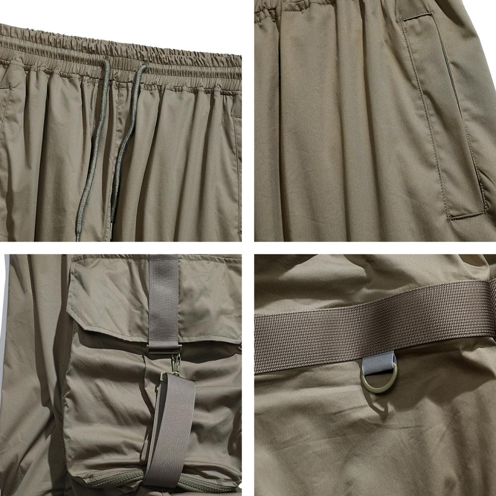 Pantalones jogger cargo monocromáticos para hombre con bolsillo con hebilla