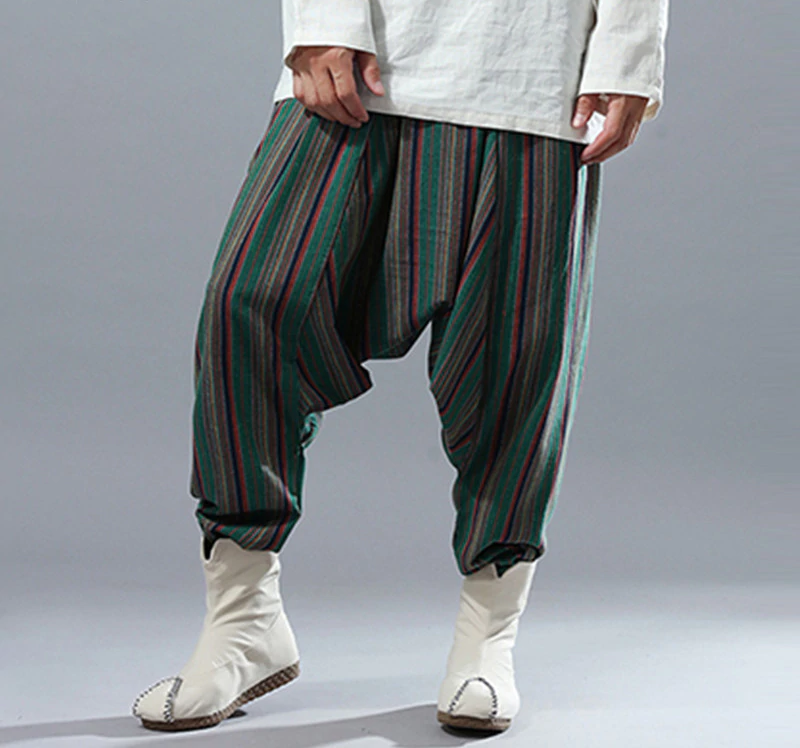 Rayas étnicas punk harem gran entrepierna estilo casual hombres pantalones