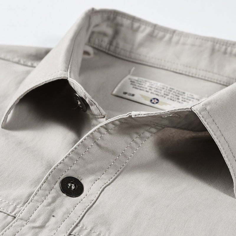 Camisa de abrigo suelta de algodón liso