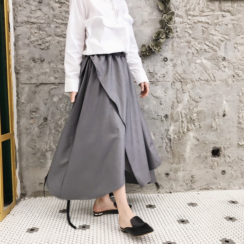 Pantalones de falda de hombre de hip hop punk sueltos de diseño irregular