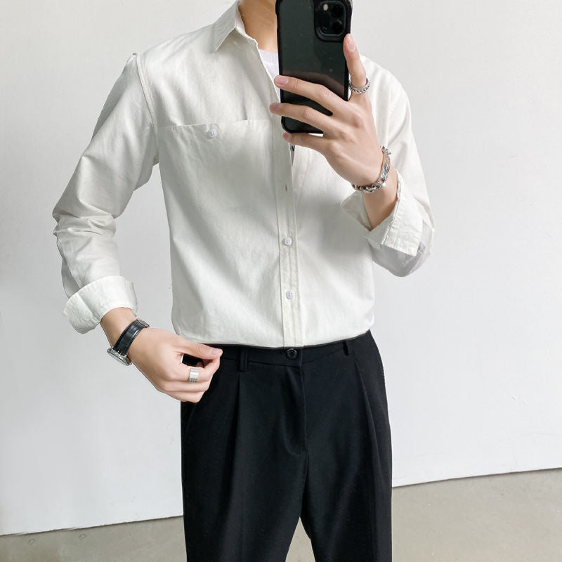 Camisa de manga larga decorada con bolsillo en el pecho