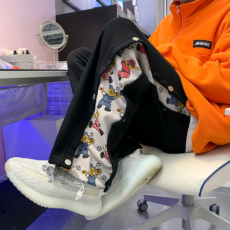 Pantalon large tube droit côté dessin animé