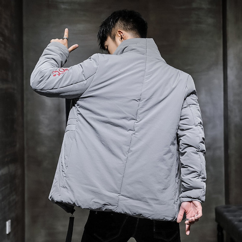 Chaqueta acolchada de color sólido con bordado de estilo chino para hombre