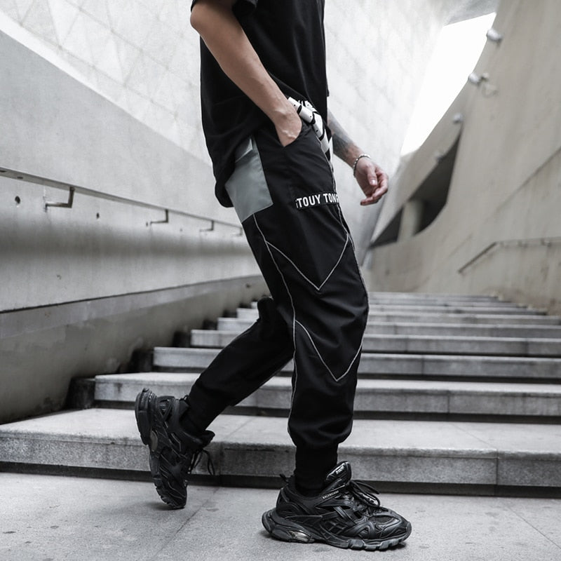 Pantalones jogger de hombre con estampado de bordes blancos sueltos