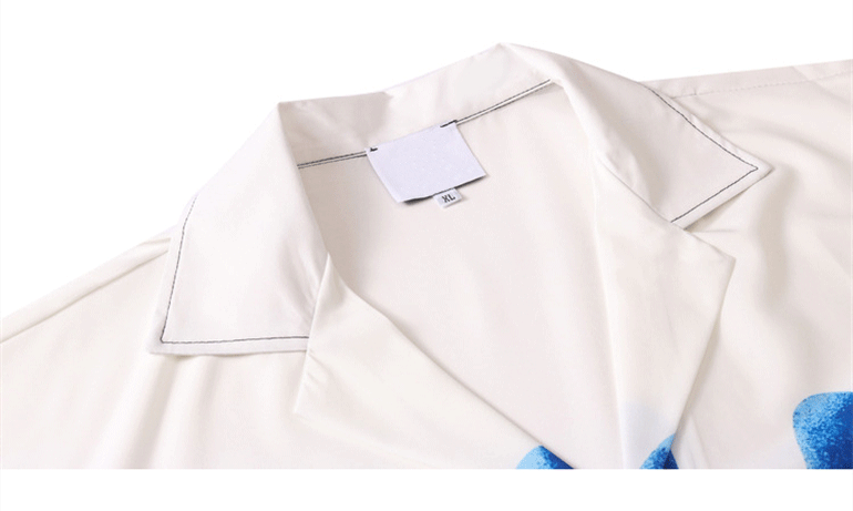 Camisa blanca estampada a mano azul