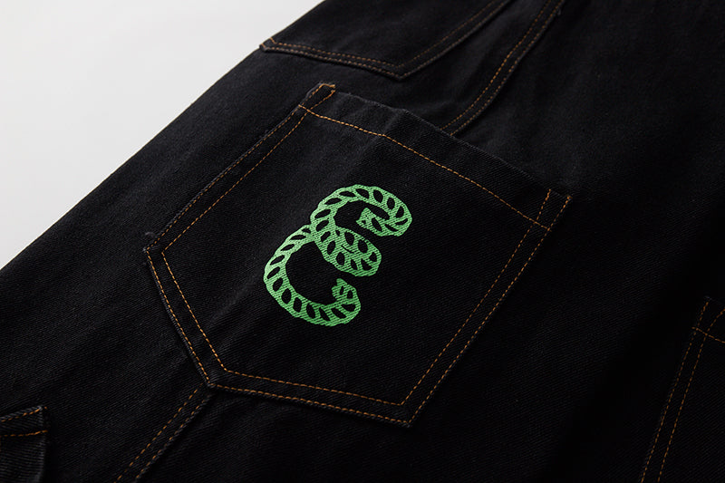 Jeans sueltos de patchwork con letras de bolsillo retro