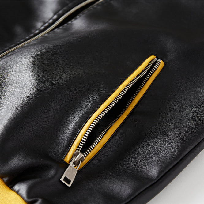 Veste en cuir brodée de lettres