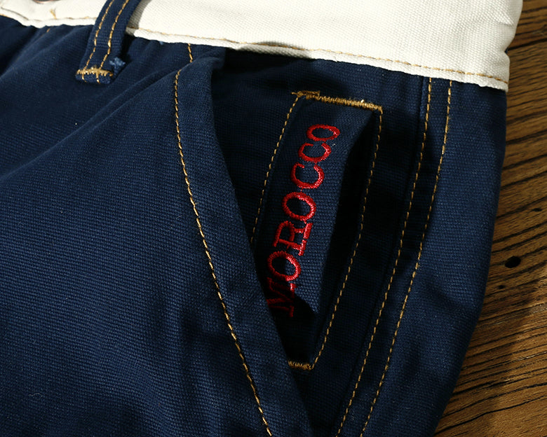 Short taille mi-haute en coton uni multi-poches