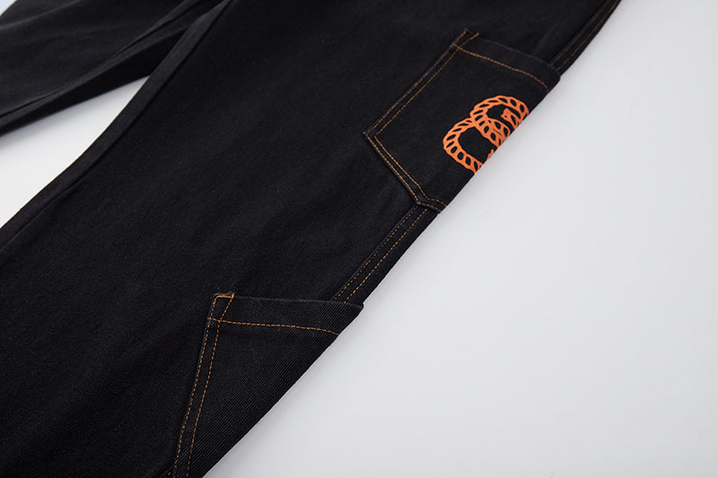 Jeans sueltos de patchwork con letras de bolsillo retro