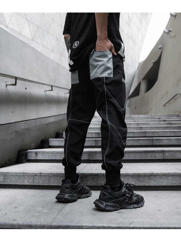 Pantalones jogger de hombre con estampado de bordes blancos sueltos