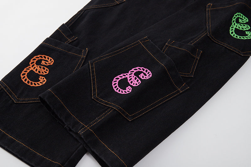 Jeans sueltos de patchwork con letras de bolsillo retro