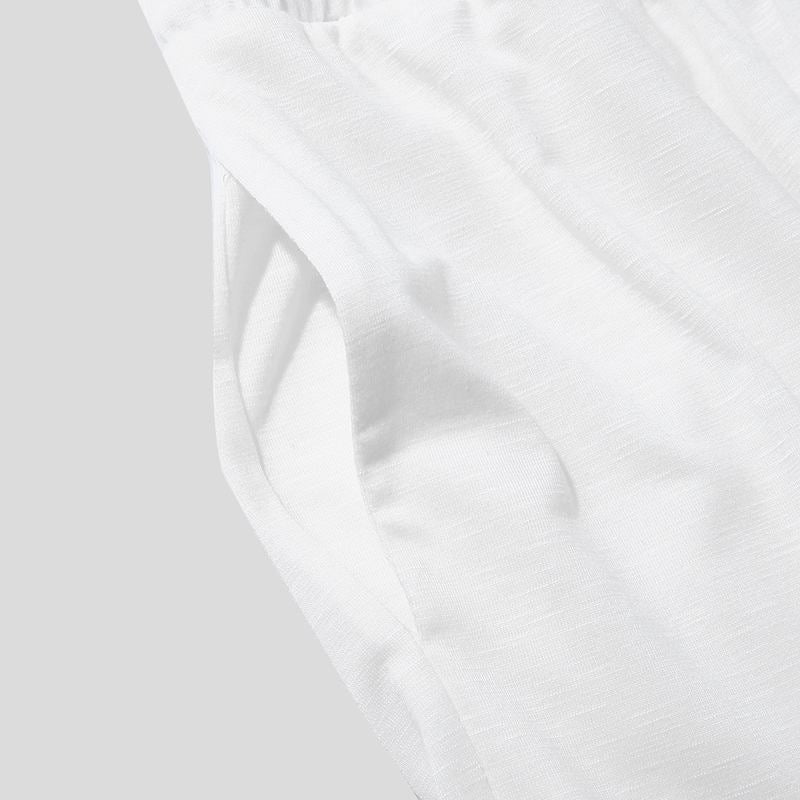 Mamelucos sin mangas con cuello en V profundo blanco