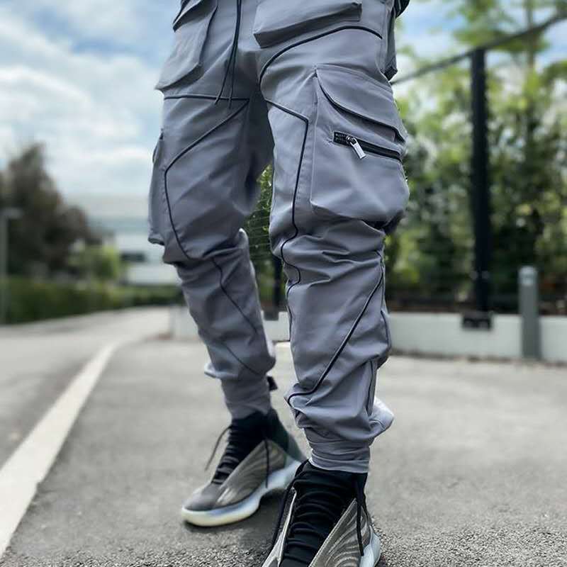 Pantalon cargo irrégulier à motif de lignes pointues