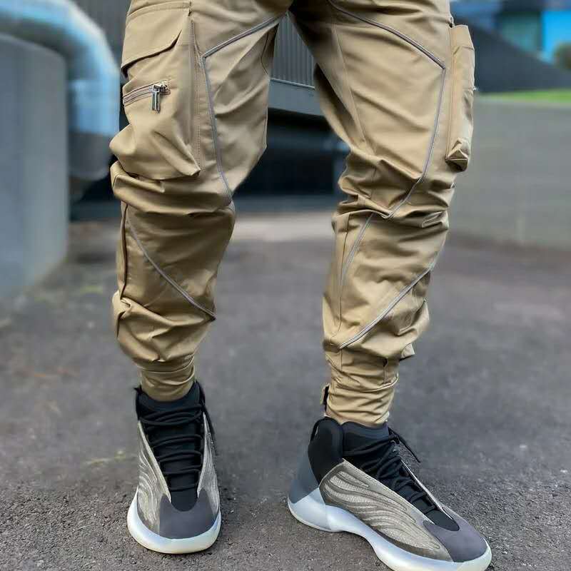 Pantalon cargo irrégulier à motif de lignes pointues