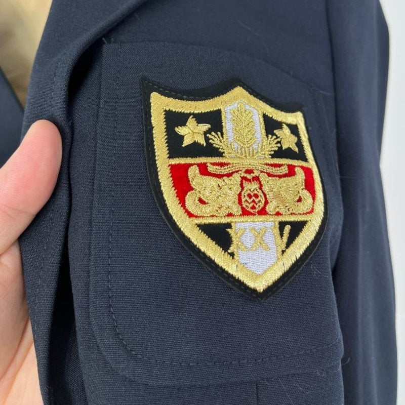 Blazer con bordado de letras en azul marino y blanco