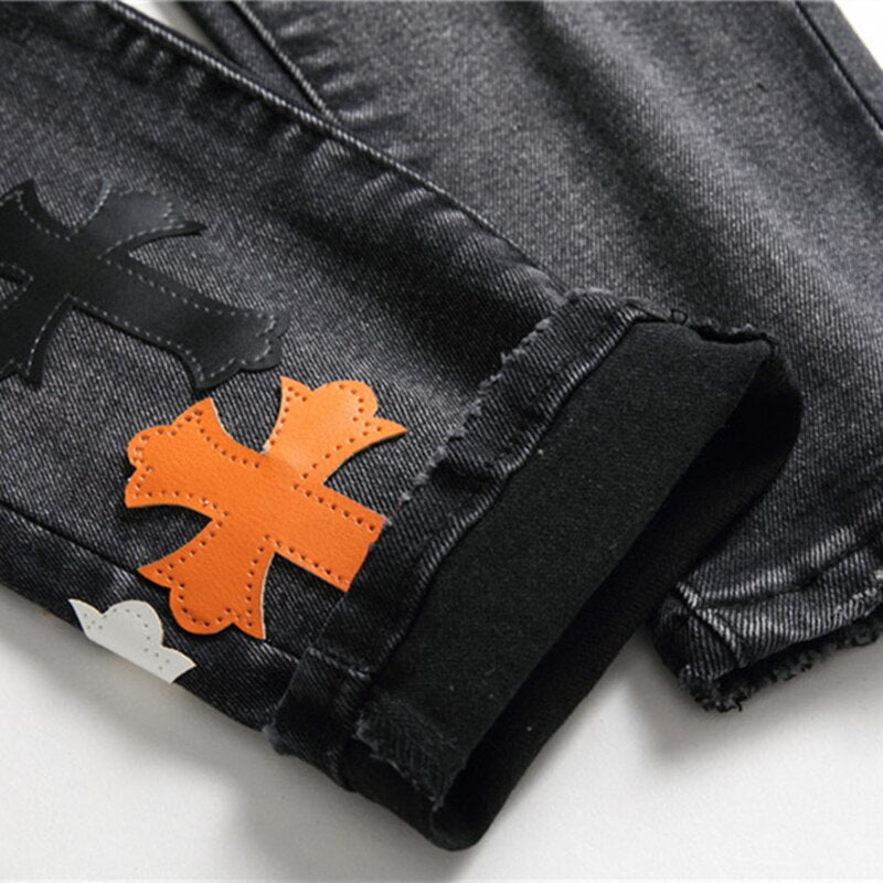 Embroidered Cross Emblem Tencel Jeans