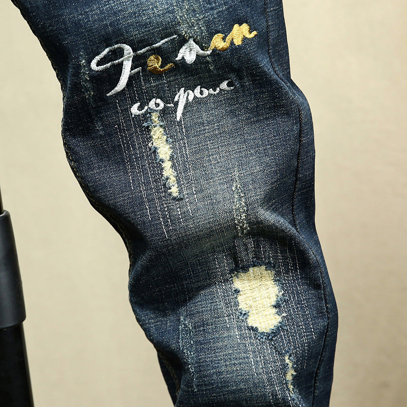 Cartoonish Patchwork Embroidery Men Slim Fit Jeans