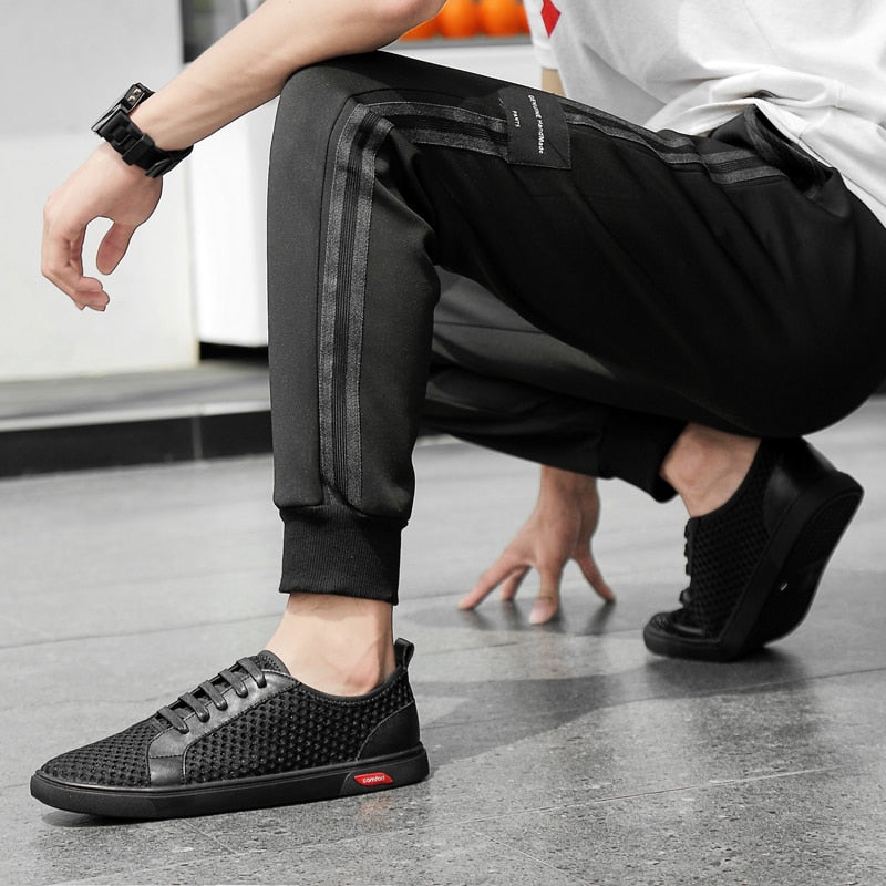 Sneaker pour hommes de style plat décontracté en maille confortable