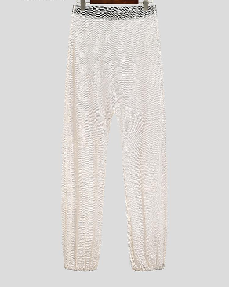 Pantalon de jogging élastique transparent en maille patchwork