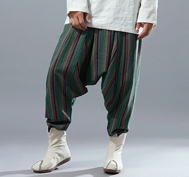Rayas étnicas punk harem gran entrepierna estilo casual hombres pantalones
