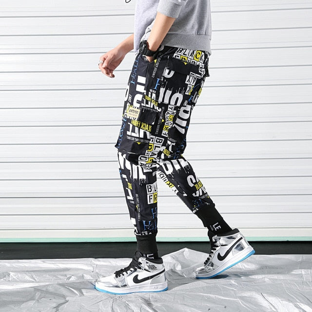 Bolsillos laterales Impreso Cargo Hip Hop Estilo casual Pantalones de hombre