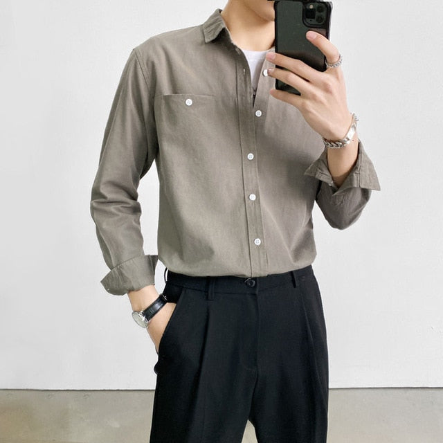 Camisa de manga larga decorada con bolsillo en el pecho