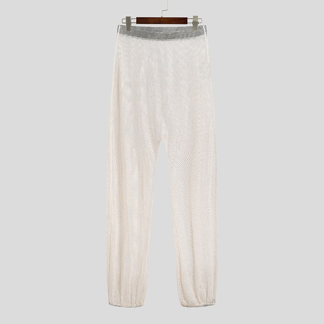 Pantalon de jogging élastique transparent en maille patchwork