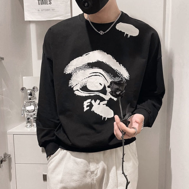 One Eye Printed Contrast Color Sweater