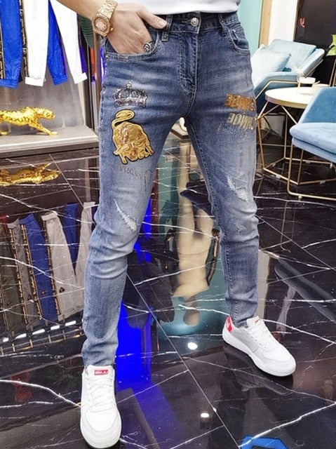 Taurus Badge Embroidery Decorated Blue Jeans