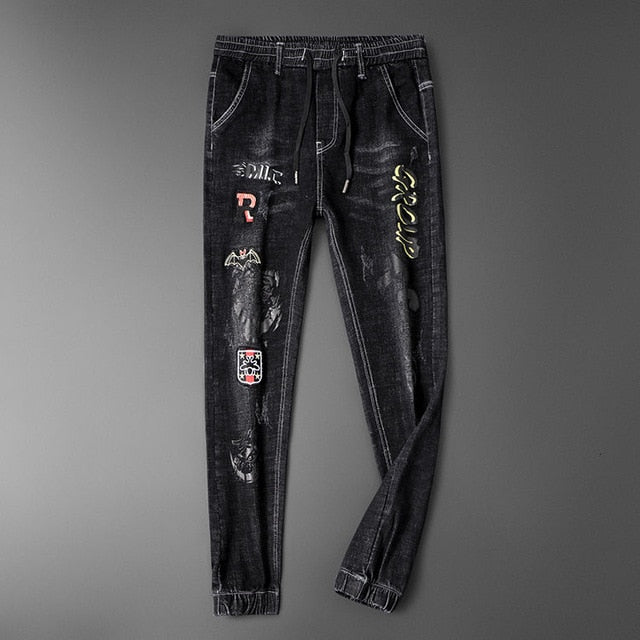 Bats Embroidery and Letter Printing Decorated Jeans